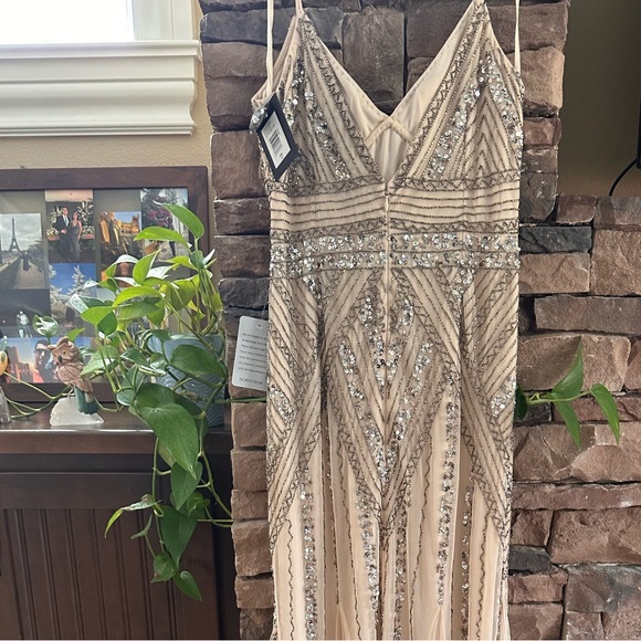 Cinderella Divine CDS418: Embroidered and Beaded V-Neck Gown for Unforgettable Occasions